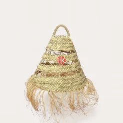 Braided Palm Leaf Conical Lampshade with Fringe 4 A front view of a conical palm leaf lampshade with braided tiers and a long fringed edge on a white background.